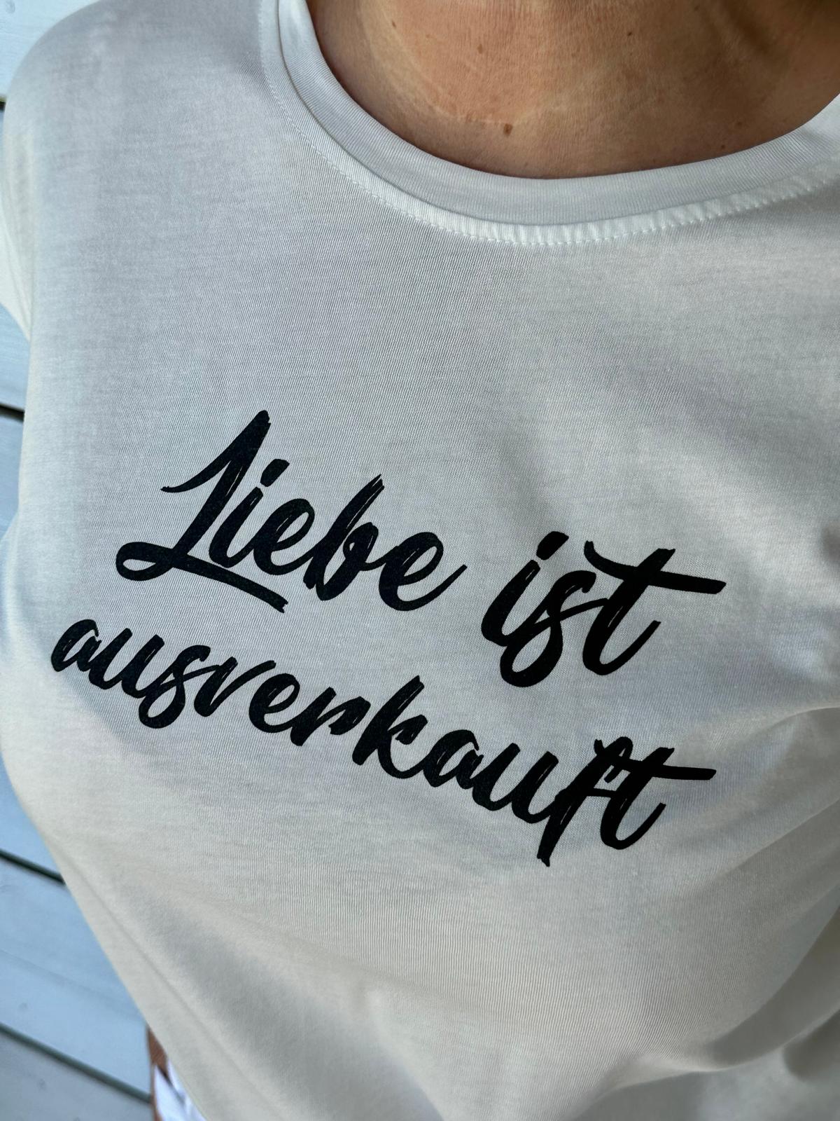 Zuckersüßes T-Shirt mit "Liebe ist ausverkauft" Schriftzug in Creméwhite