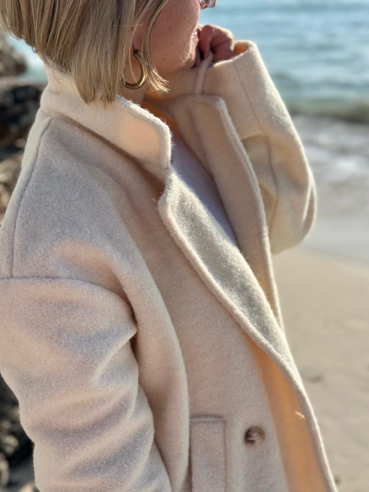 Eleganter Wollmantel in Creme