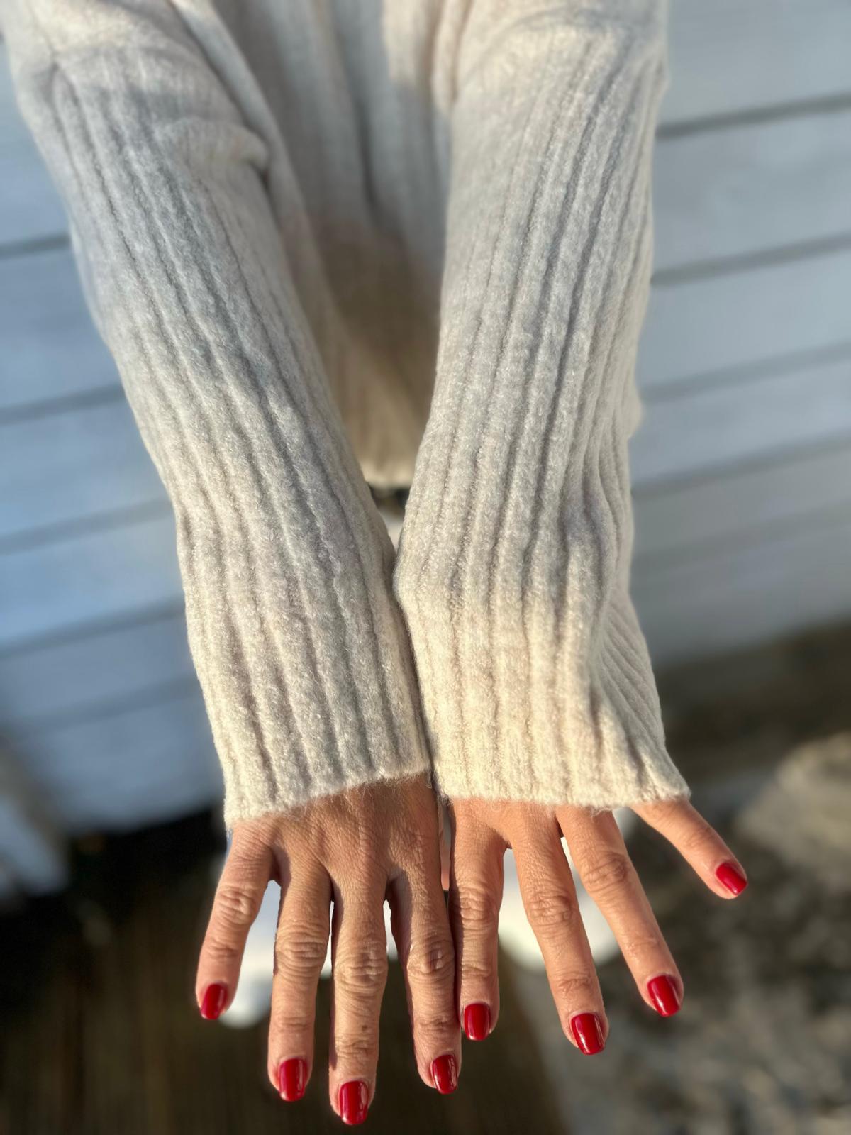 Kuscheliger Rippstrick-Rollkragen in Cremé