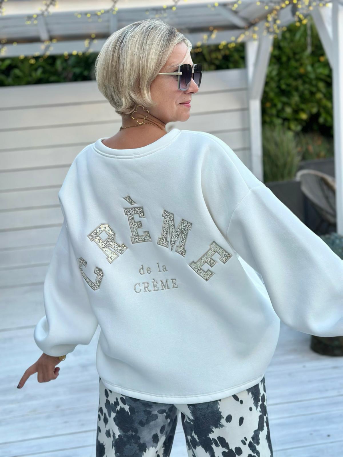 Crème de la Crème – Oversize Sweatshirt mit funkelnder Pailletten-Applikation
