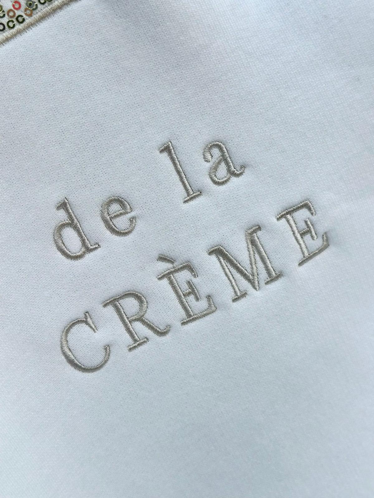 Crème de la Crème – Oversize Sweatshirt mit funkelnder Pailletten-Applikation