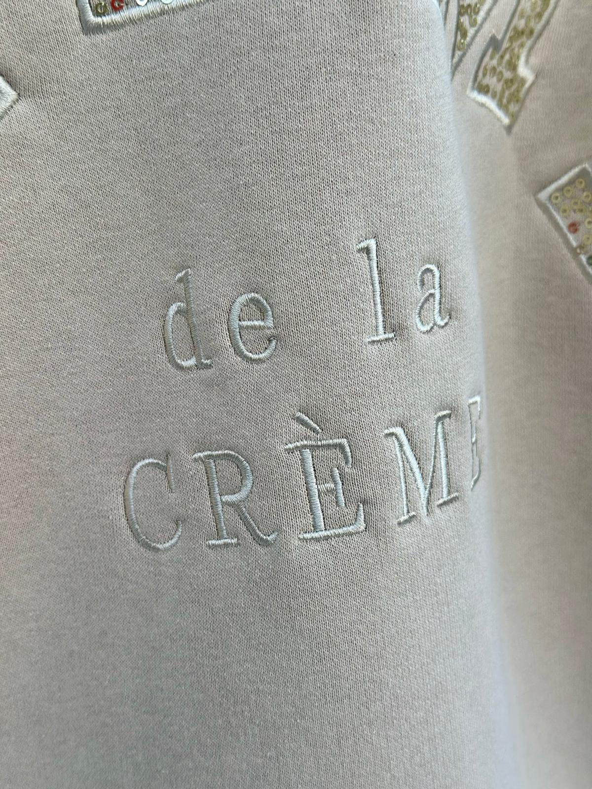Crème de la Crème – Oversize Sweatshirt mit funkelnder Pailletten-Applikation in Taupé